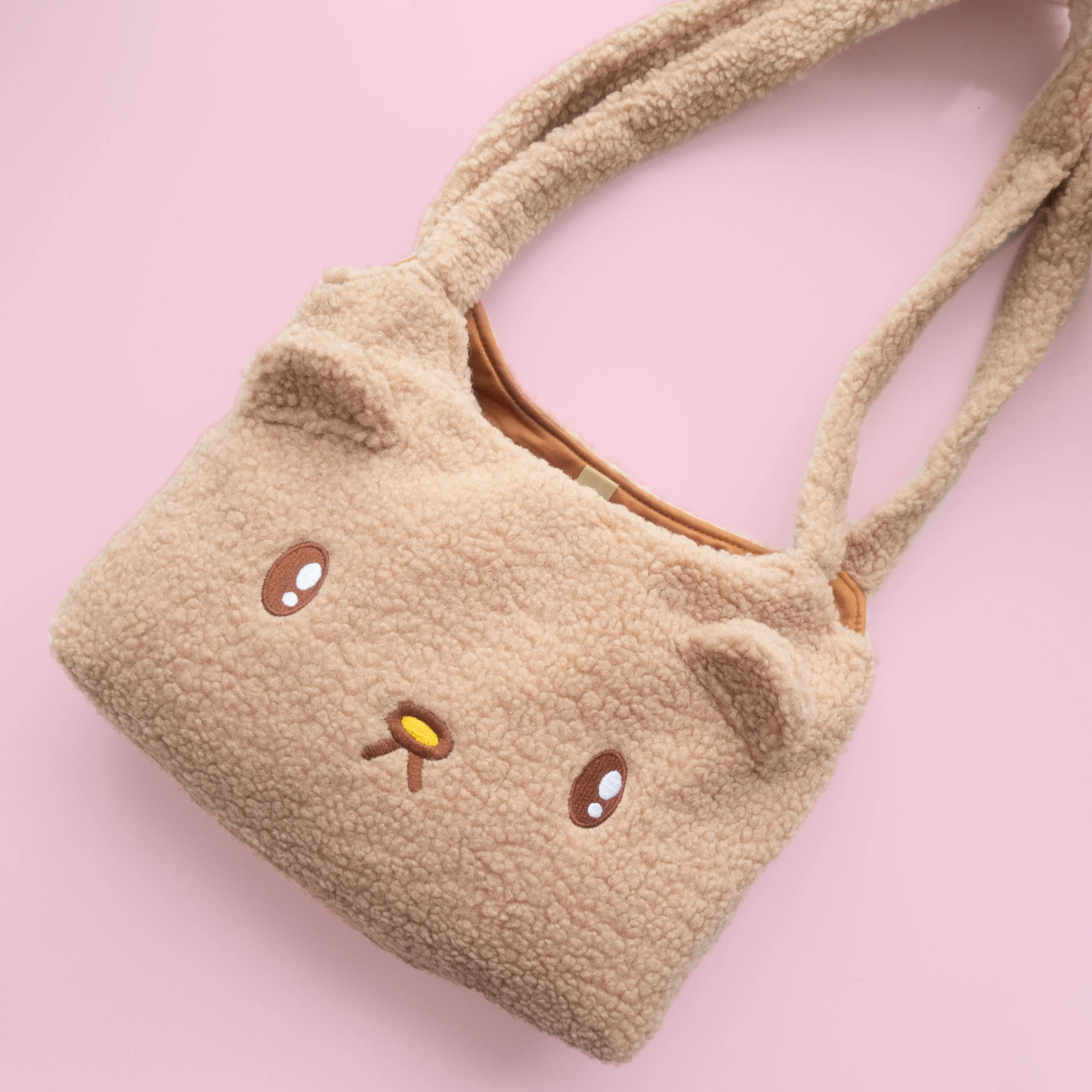 Fluffy Osito-shaped tote bag on a pink background